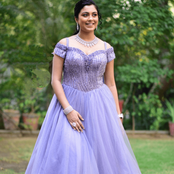 Lavender designer engagement gown for women with stone work and net flare - Radharani Vastralaya