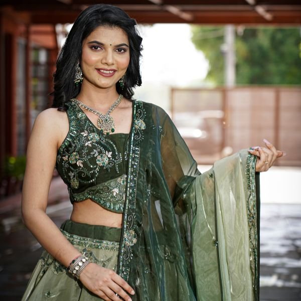 Dark green designer lehenga choli with embroidery and net dupatta for women - Radharani Vastralaya