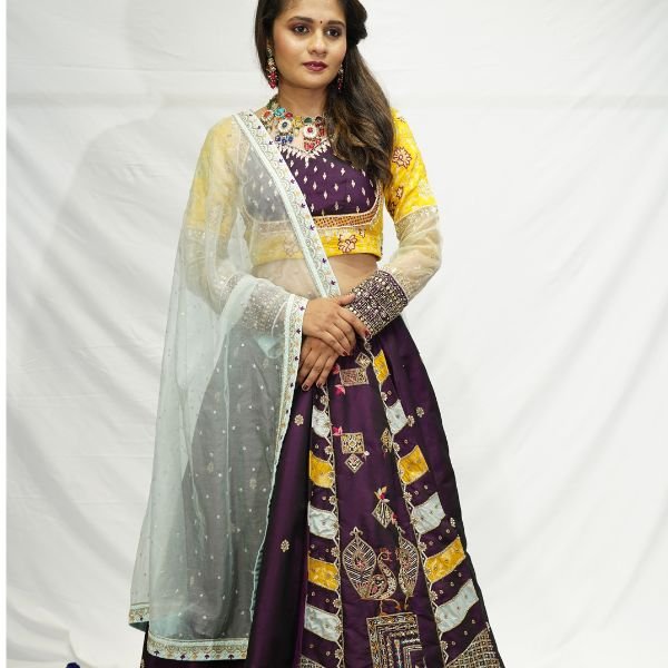Yellow and purple haldi lehenga choli with embroidery and net dupatta for bride - Radharani Vastralaya