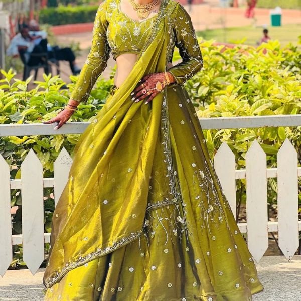 Green mehendi lehenga choli with embroidery and dupatta for bride - Radharani Vastralaya